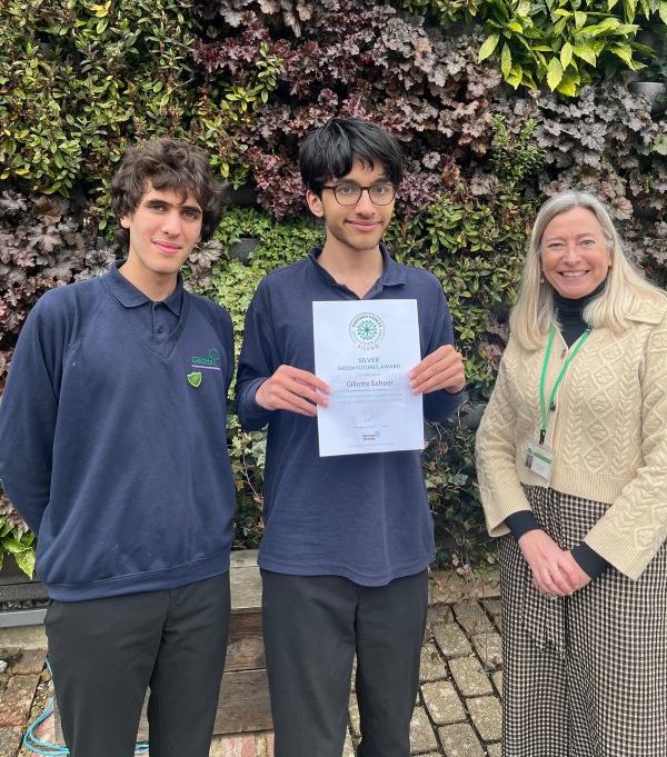 Isaac Urch and Theo Khoury from Gillotts school showing their Silver award certificate with headteacher, Catharine Darnton