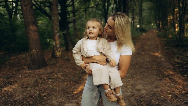 mother and child in the woods